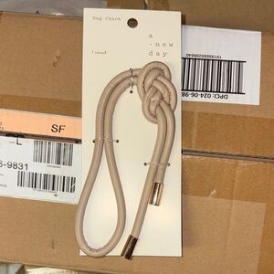 5/$15 A New Day Beige Bag Charm